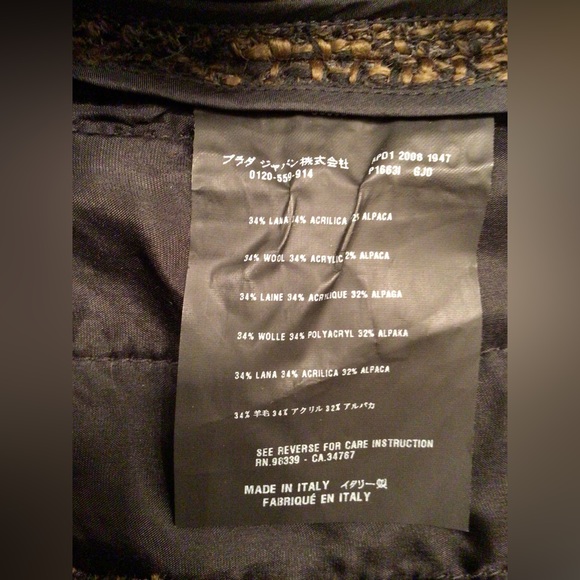 Classic PRADA brown-black tweed knee skirt
Size IT 40 - Picture 5 of 6